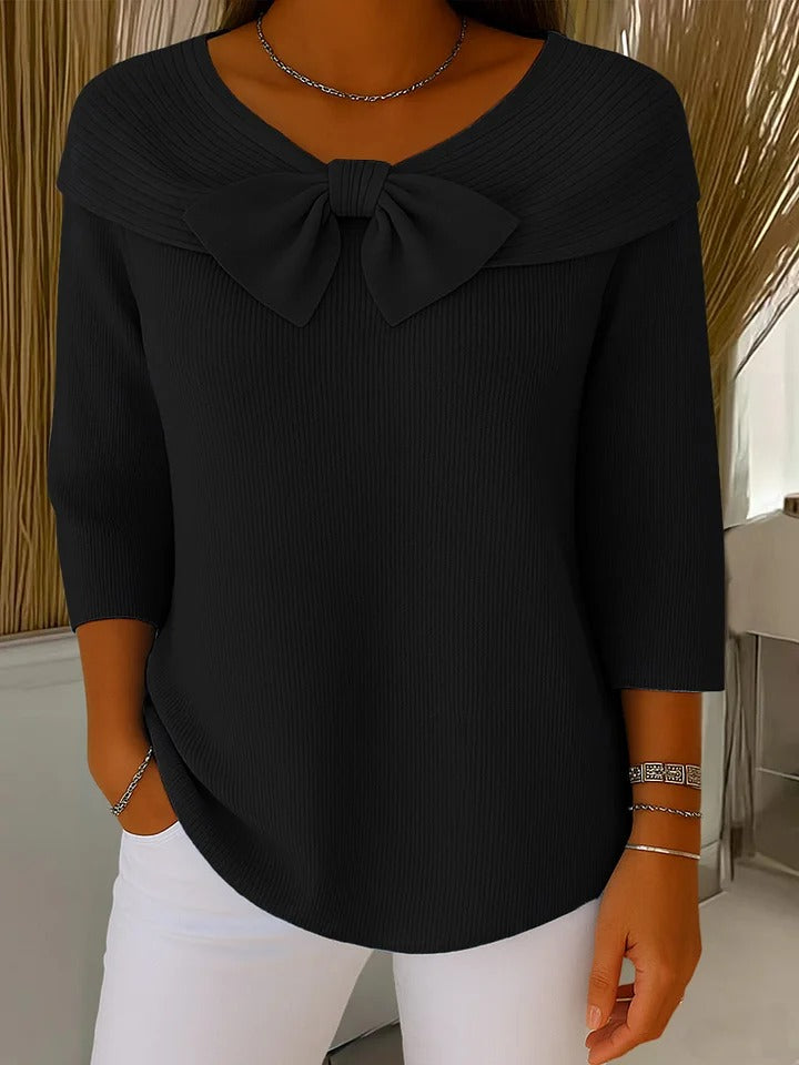 Tivella bow neckline sweater in black, front view