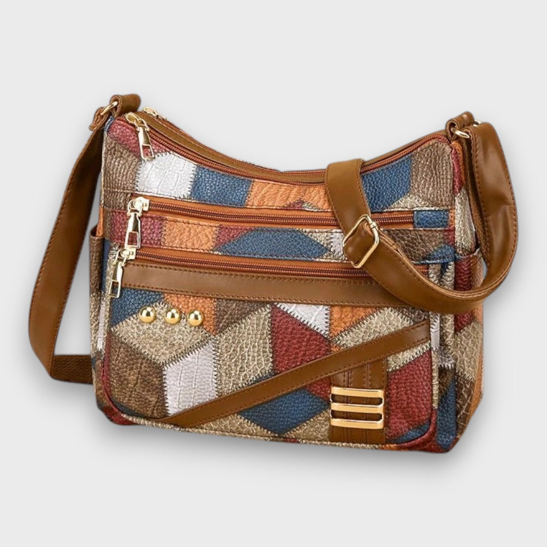 Maria patchwork shoulder bag in multicoloured tan, blue and red, front view