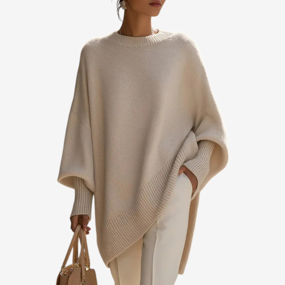 Aureliana oversized knit sweater in apricot, front view with asymmetric hem