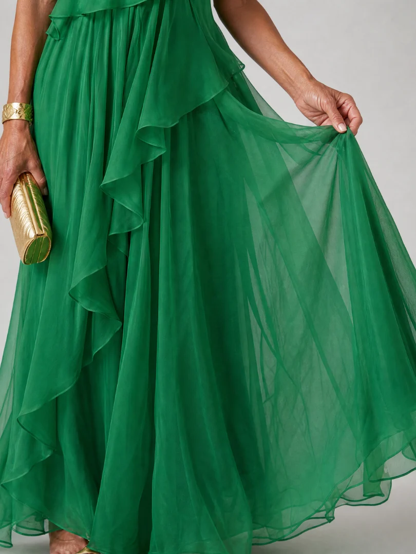 Victoria maxi dress in green, close-up of ruffled flowing skirt