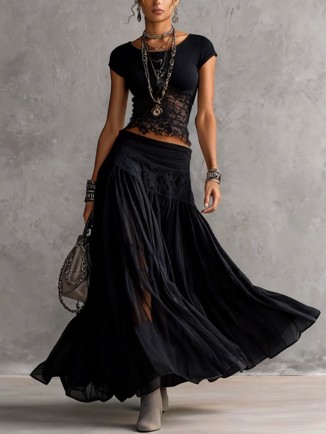Beatrice lace top and pleated skirt set in black, full-length front view
