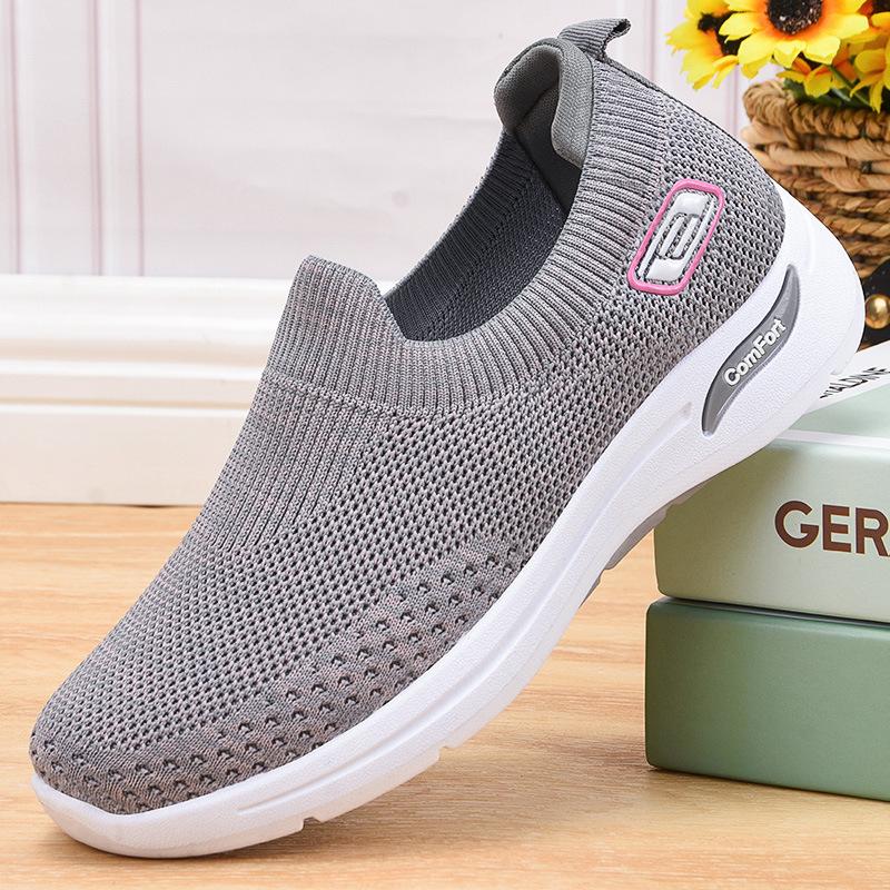Sayaka slip-on shoes in grey, side view with heel pull tab