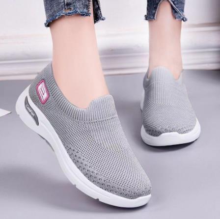 Sayaka slip-on shoes in grey, worn front view