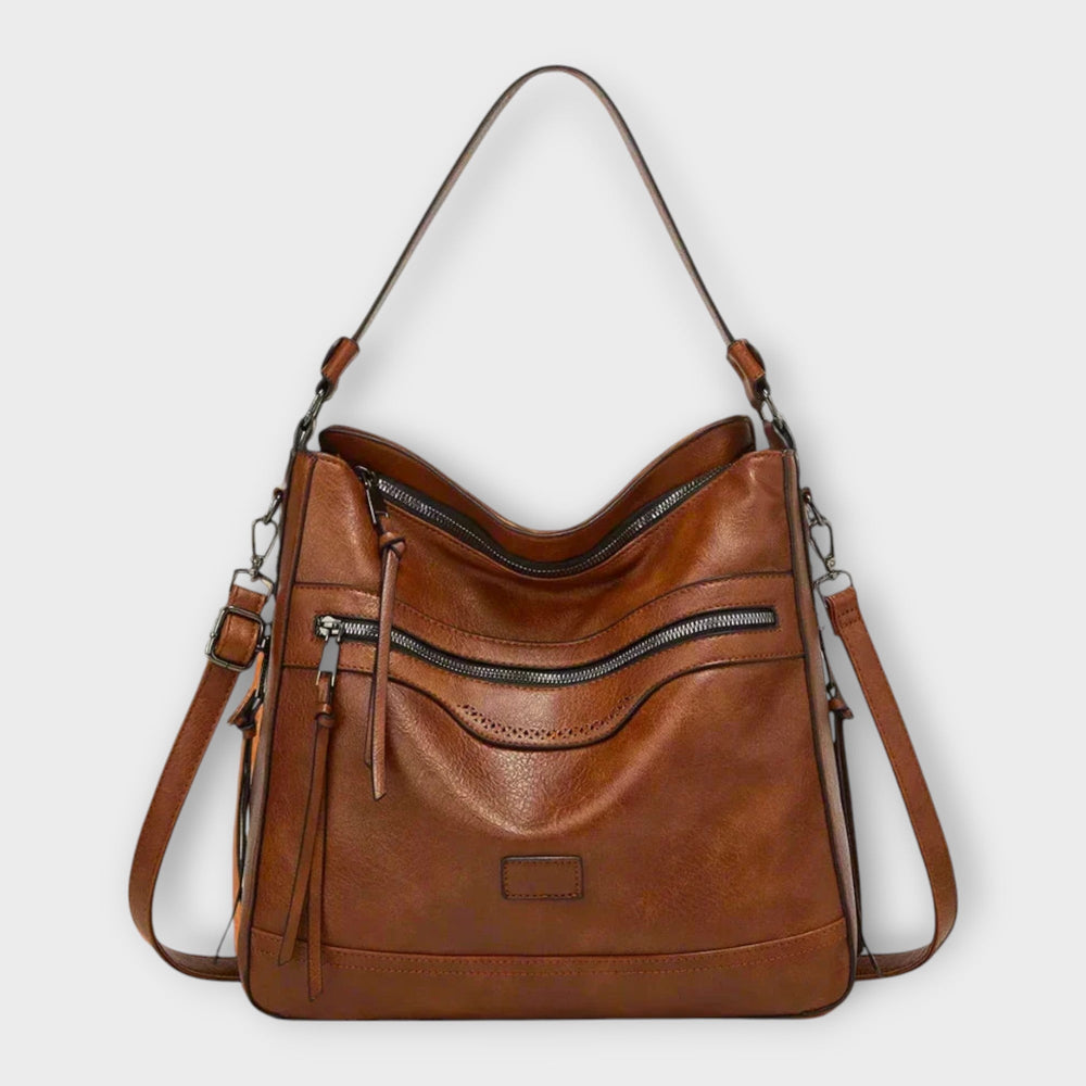 Élodie classic retro shoulder bag in brown, front view with tassel zip pulls