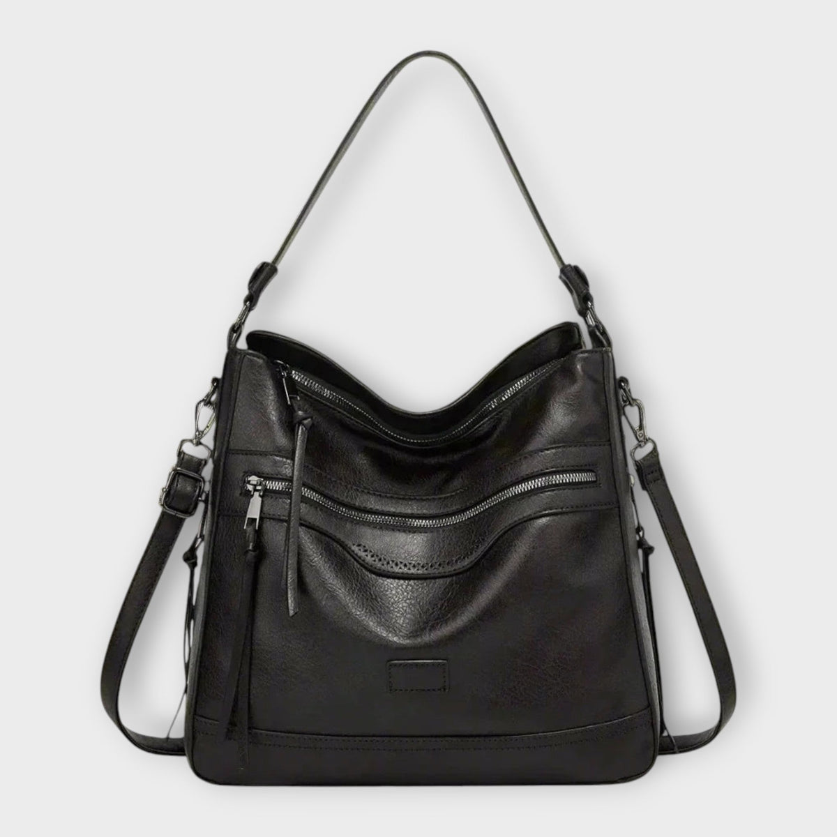 Élodie classic retro shoulder bag in black, front view with crossbody strap