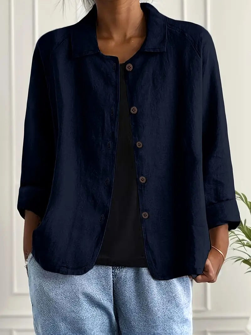 Cerisette loose open blouse in navy blue, worn open over denim, front view