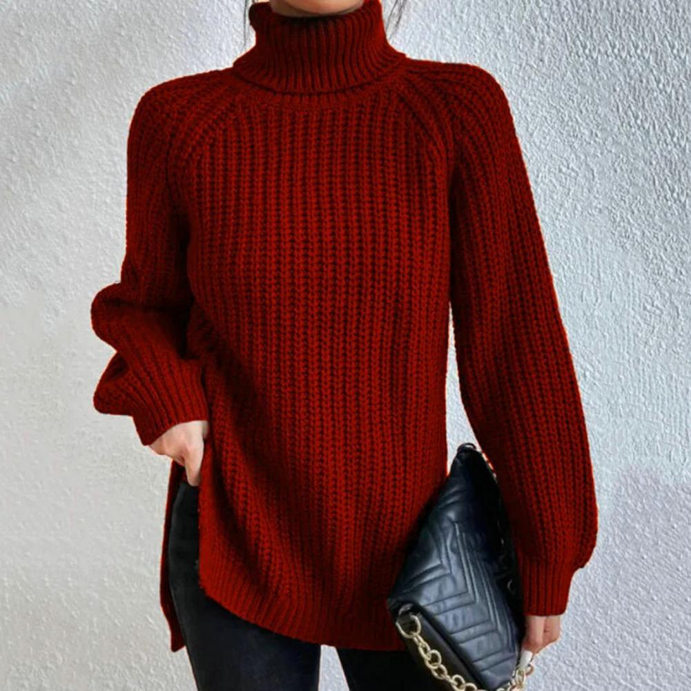 Averys elegant knit sweater in red, front view with side hem split