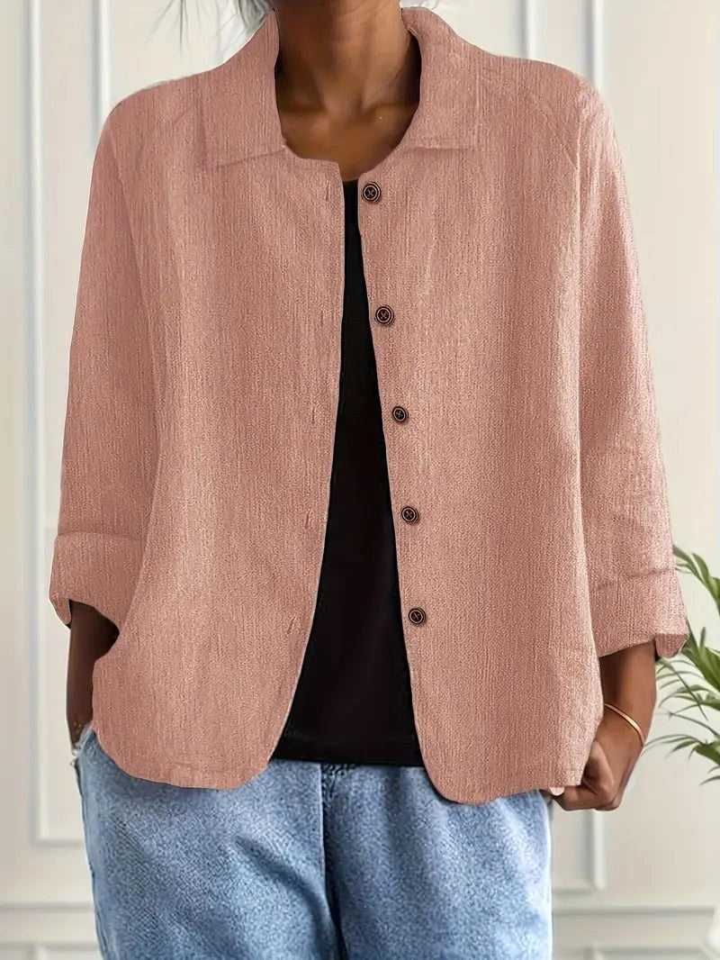 Zenaide relaxed button blouse in clay pink, front view worn open over a black top
