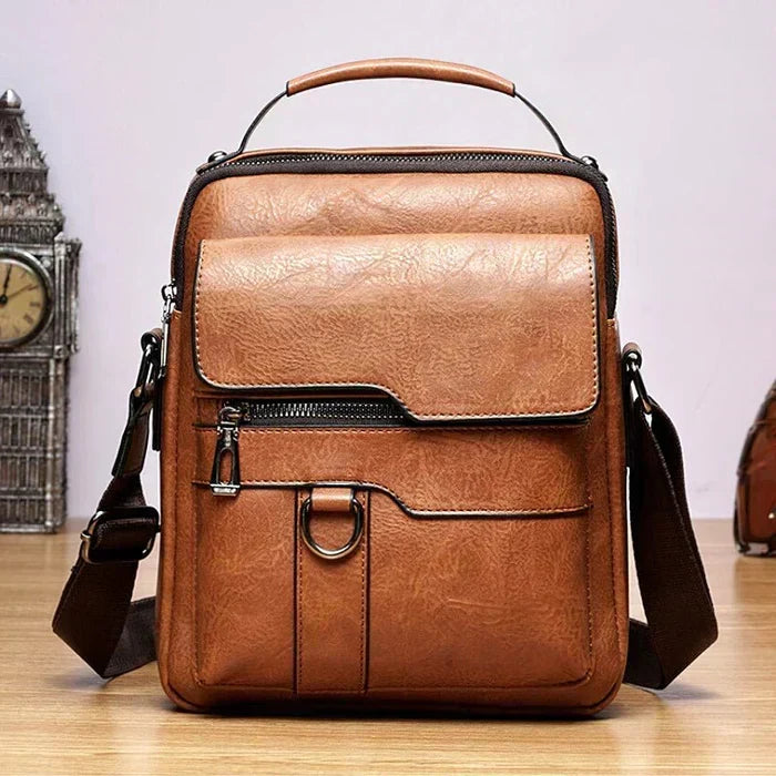 Ismeria shoulder bag in light brown with strap extended, front view