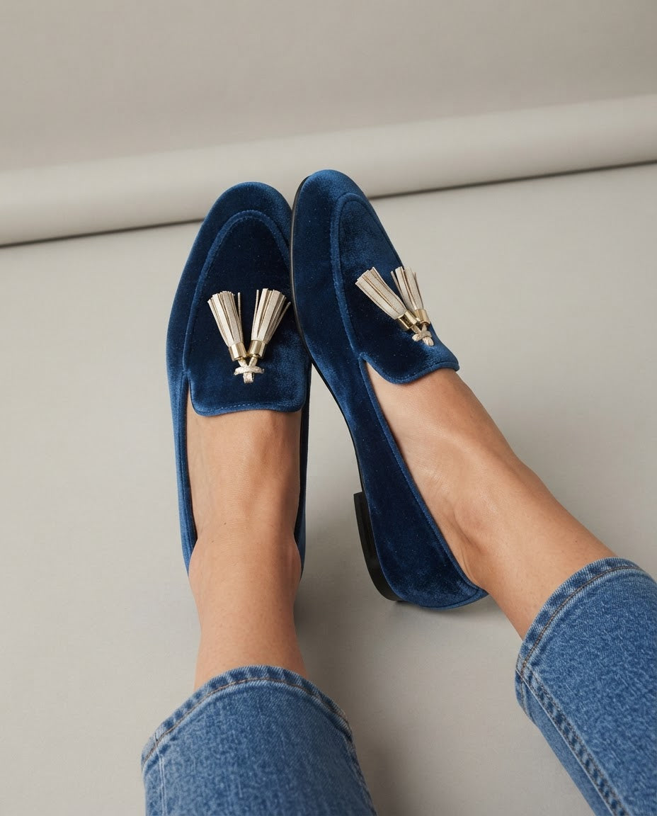 Vittoria blue velvet loafers with metal tassels, worn overhead view