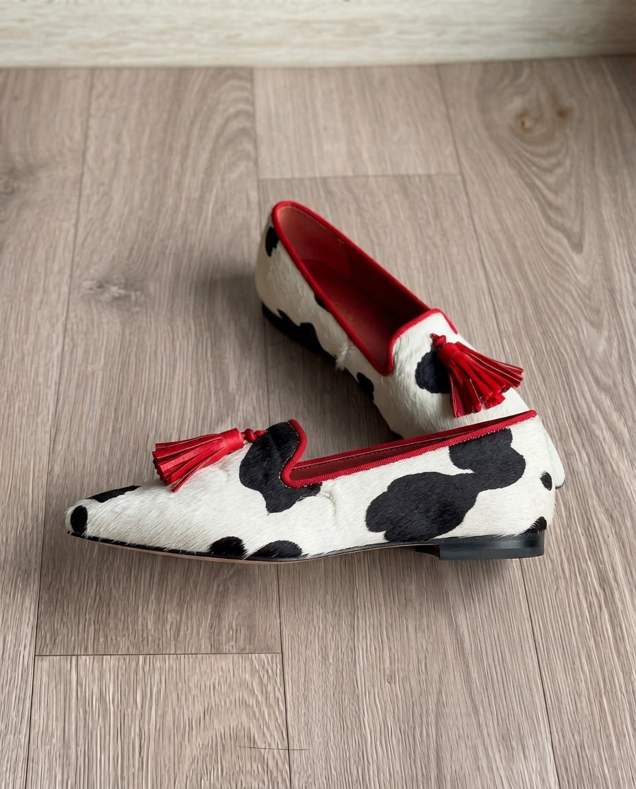 Ginevra cow print loafers with red tassels and red lining, product view