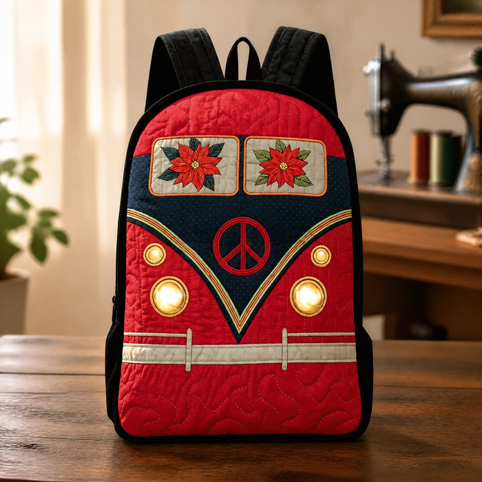 Christmas quilted backpack in red and navy with black straps, front view
