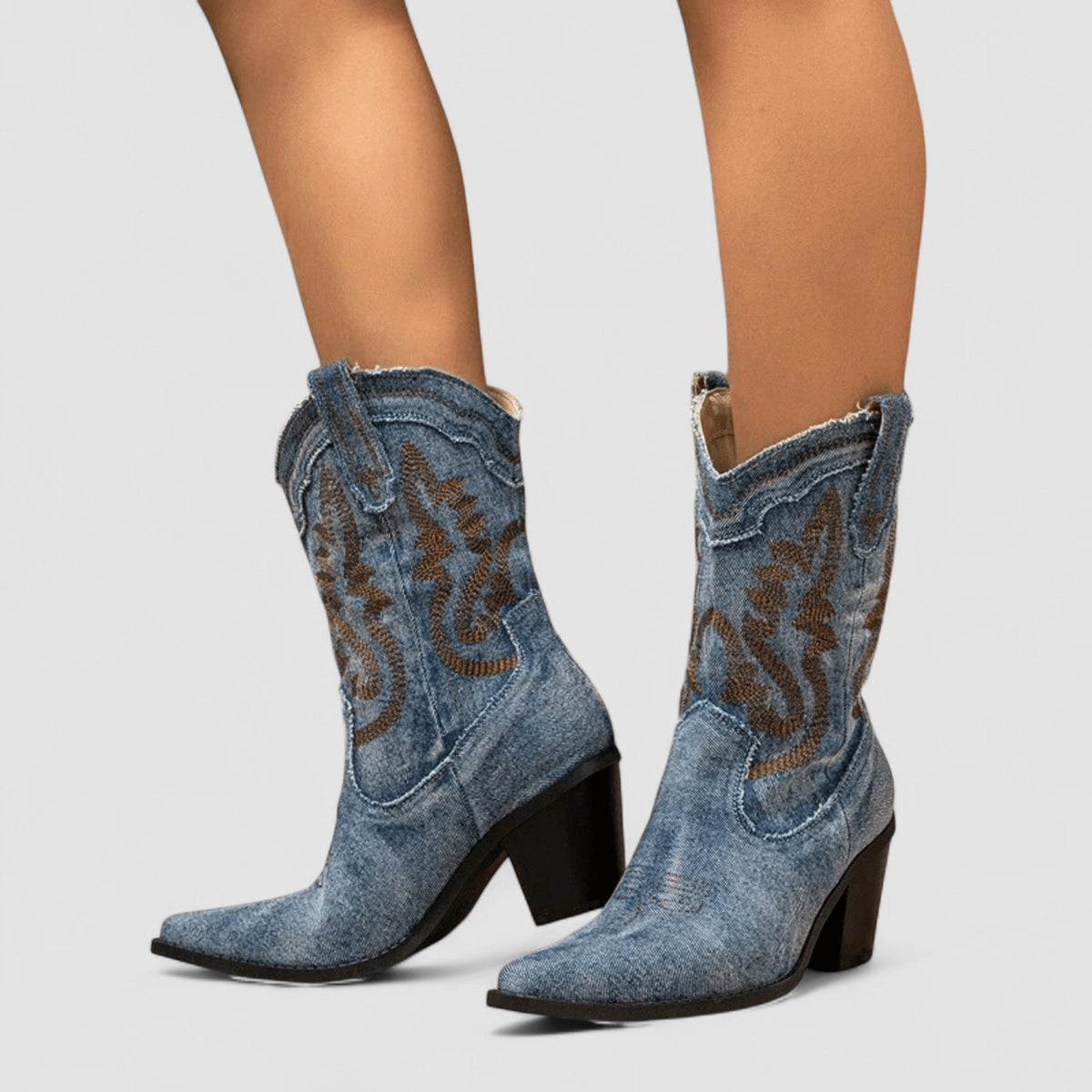 Callie western ankle boots in denim blue, worn front view
