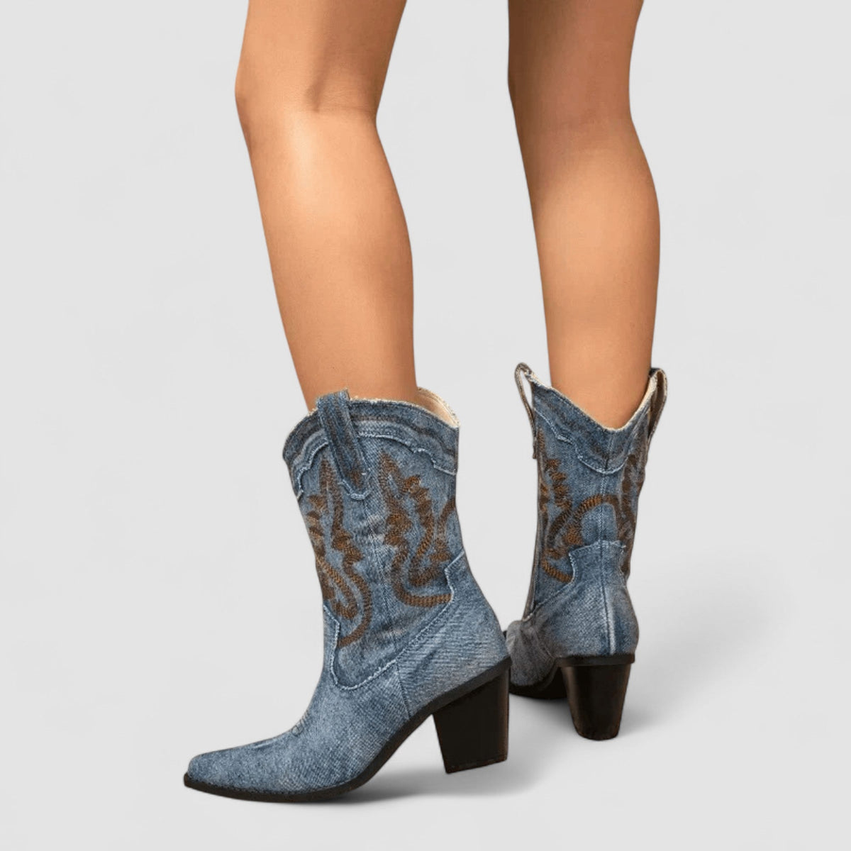 Callie western ankle boots in denim blue, back view on model