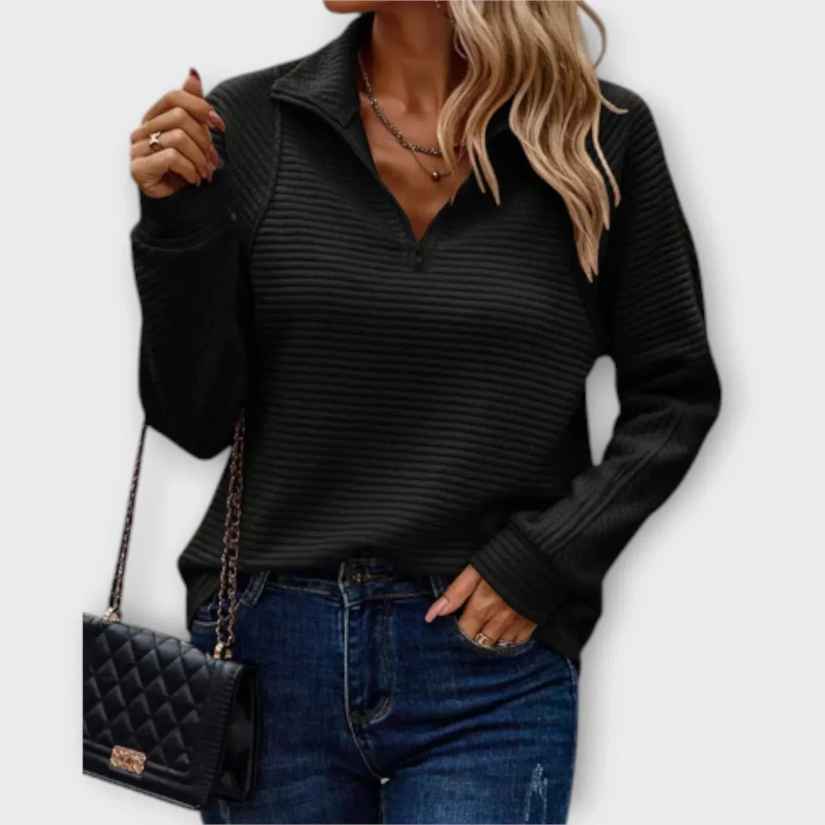 Veylin halfzip pullover in black, front view worn with denim