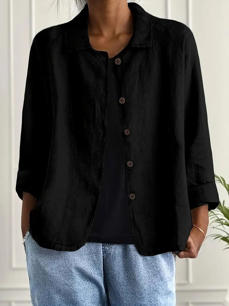 Ysolde open shirt blouse in black, worn open over a vest top and denim