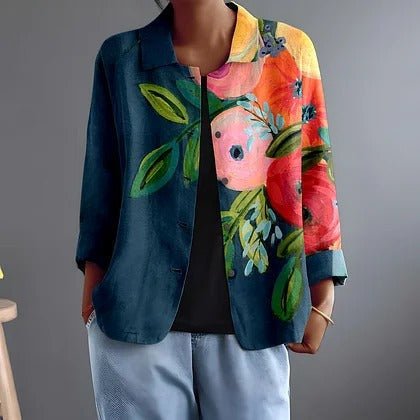 Persephone blouse in teal multicolour with painted poppies, worn open, front view