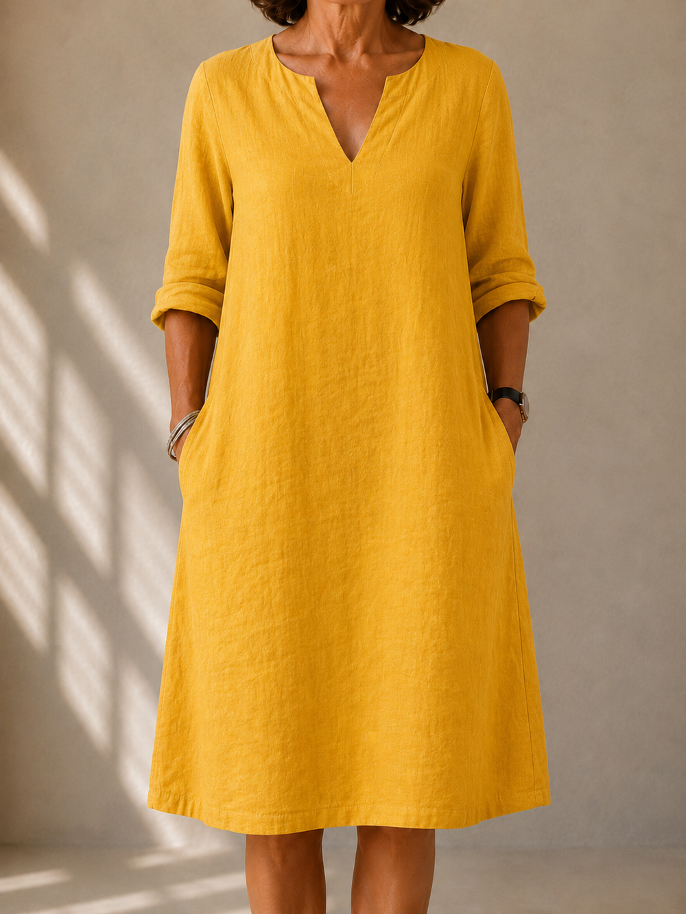 Monique flowy long-sleeve dress in mustard yellow, front view