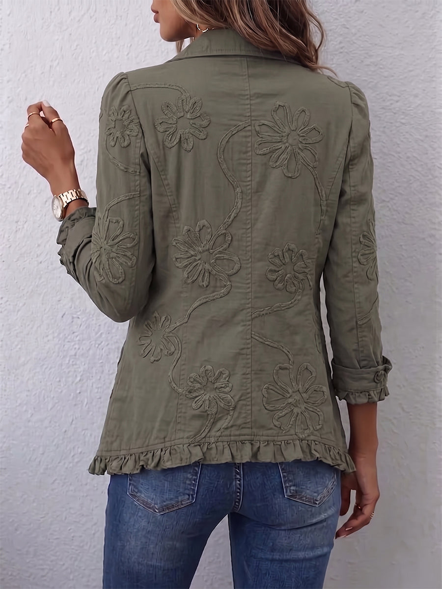 Ascensión embroidered ruffle jacket in vintage green, back view showing floral embroidery