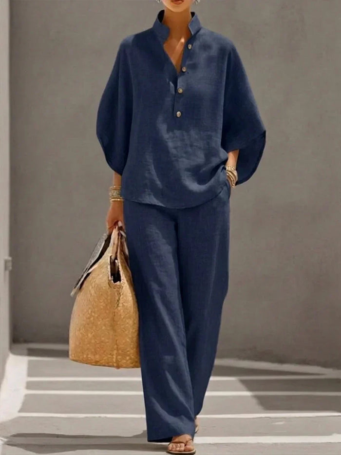 Sophie batwing-sleeve and wide-leg trousers set in navy, full-length front view