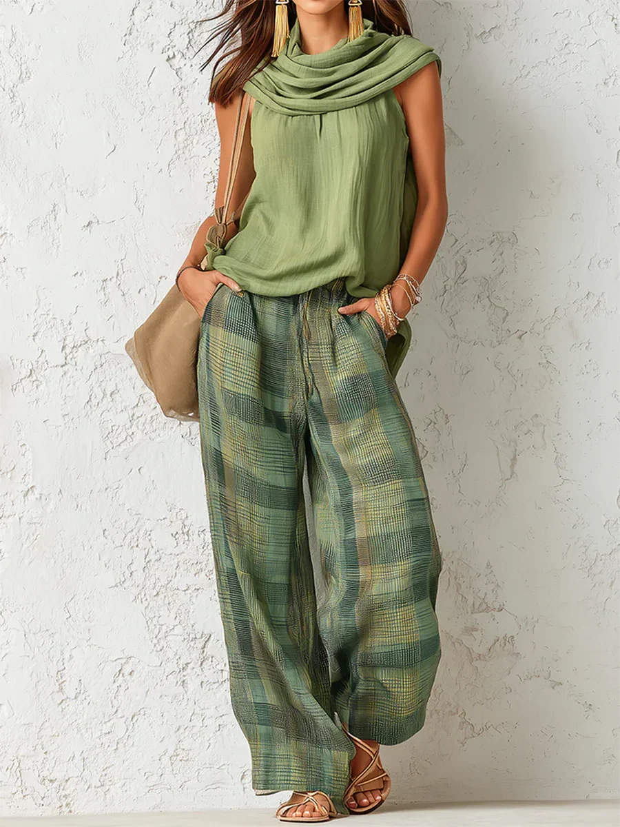 Essenza two-piece set in green, front view with checked wide-leg trousers