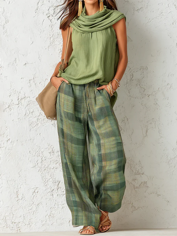 Essenza two-piece set in green, front view with checked wide-leg trousers