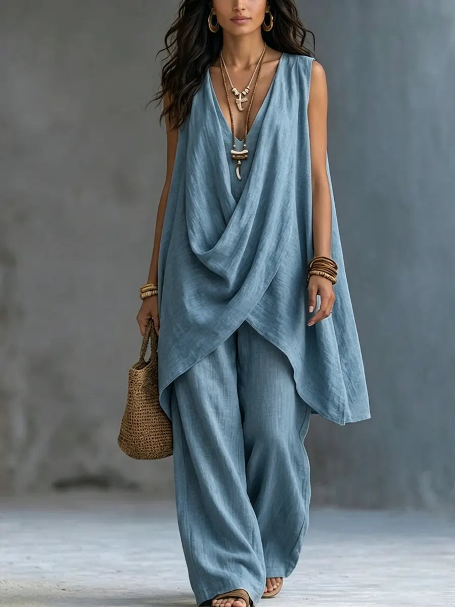 Bohemian loose co-ord set in blue, crossover top with wide-leg trousers, walking front view