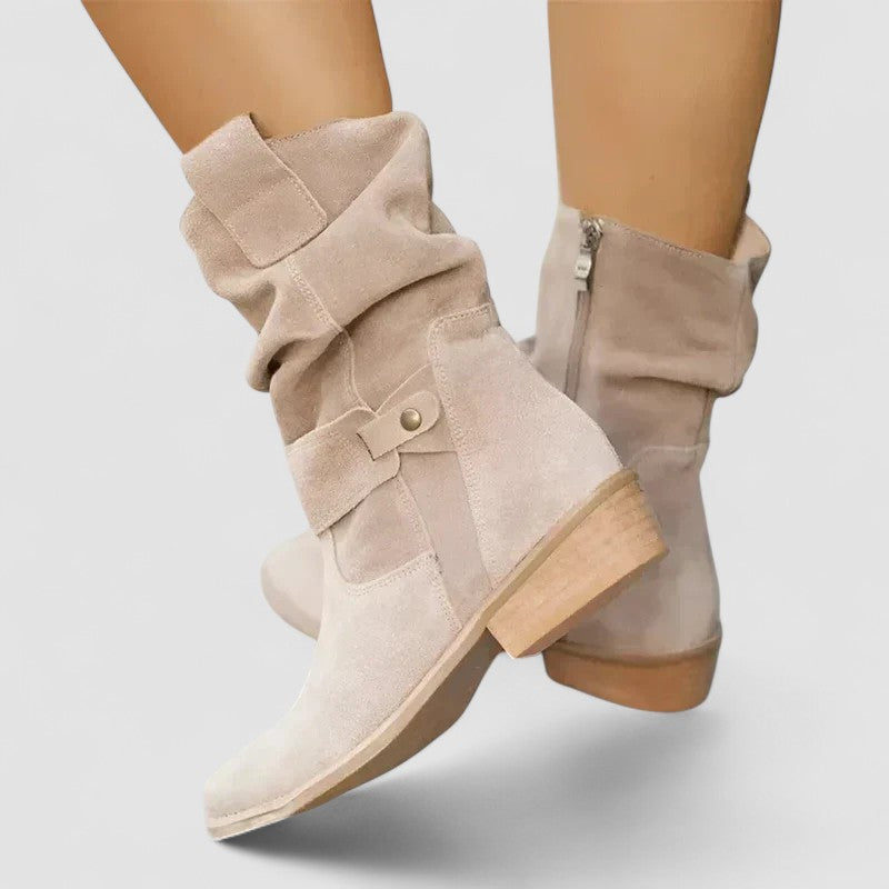 Elyse slouch-style western boots in beige, worn front view
