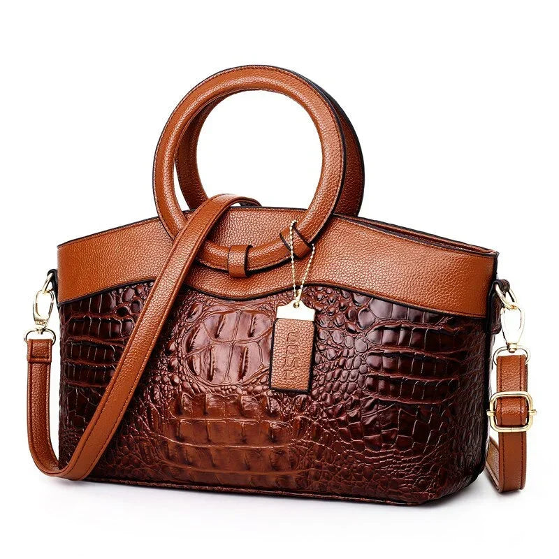 Frances shoulder bag in brown with detachable strap, three-quarter view