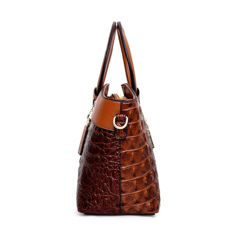 Frances croc-embossed shoulder bag in brown, side profile view