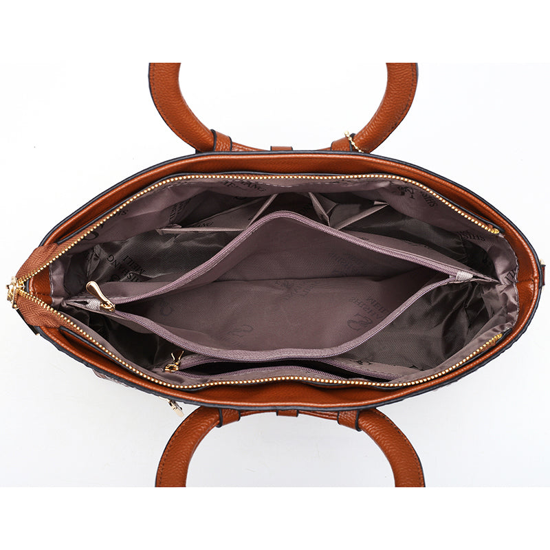 Frances shoulder bag interior with lined compartments and central zip divider