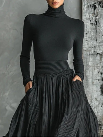 Prudence set in black, close-up of fitted roll-neck and gathered waistband