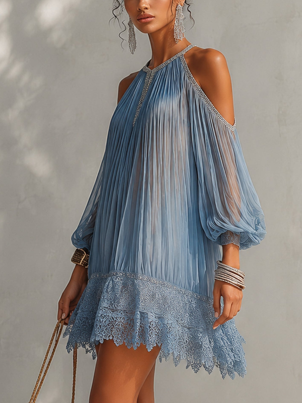 Séraphine blue mini dress, three-quarter view showing pleated fall