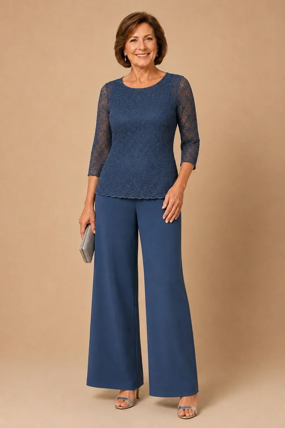 Priscilla beaded lace trouser suit in steel blue, full-length front view with clutch