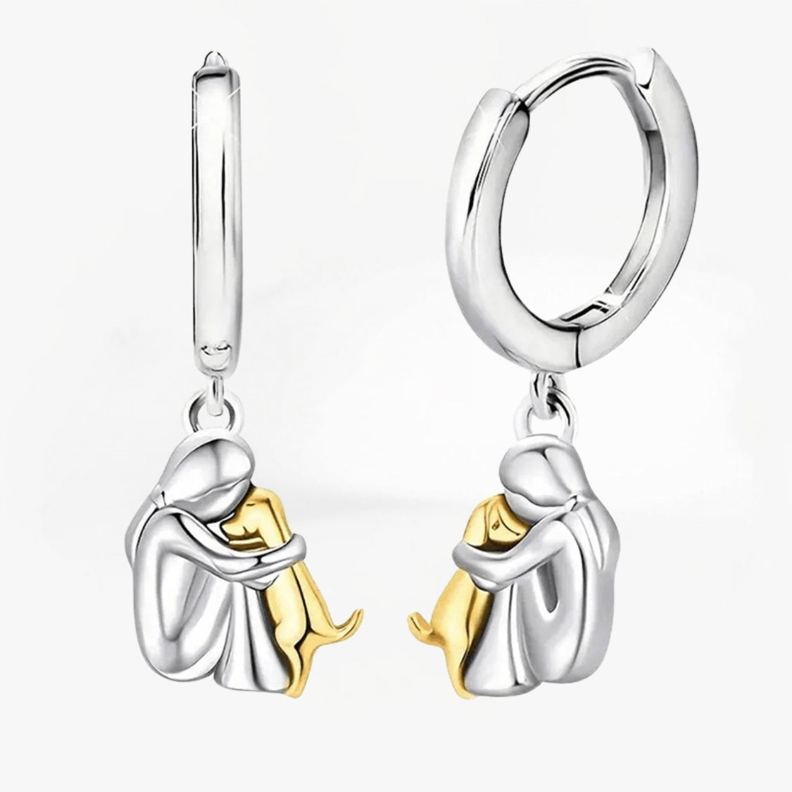 Seleno dog icon earrings in silver with gold dog charm, side view