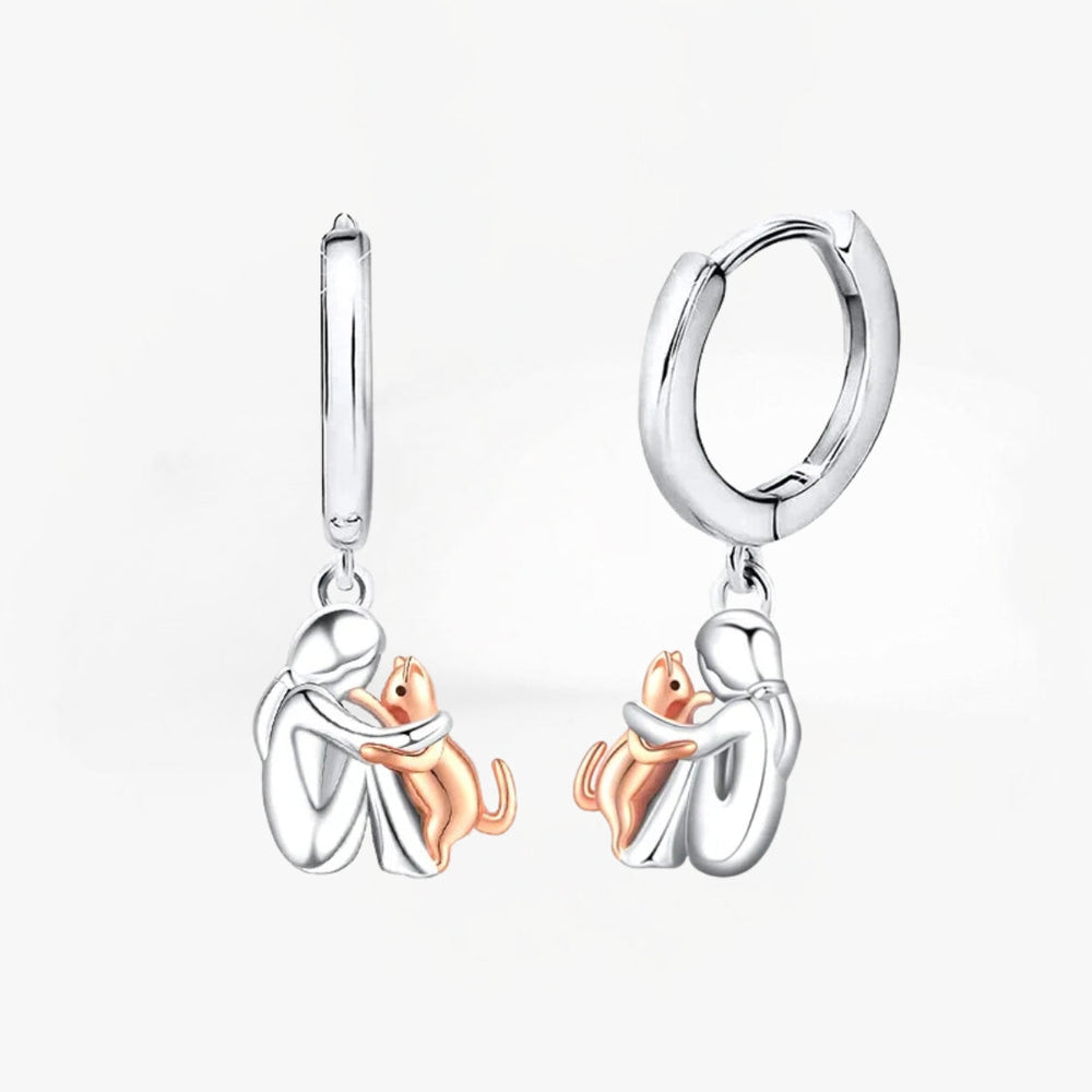 Elowen cat icon earrings in silver with rose gold cat charm, pair view
