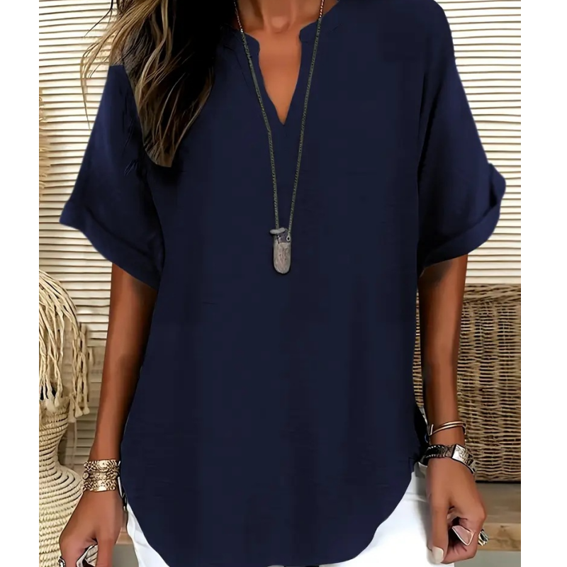 Livia airy V-neck blouse in navy blue, front view with white shorts