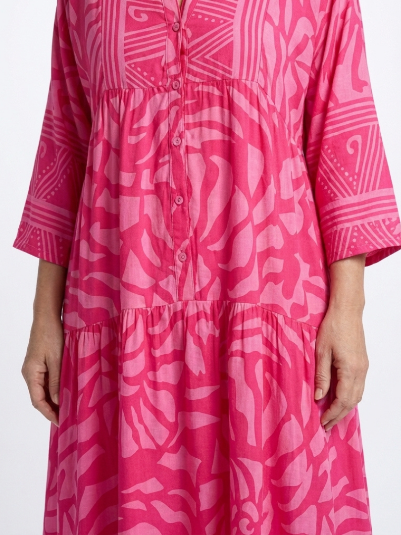 Marielle midi dress close-up of button placket and swirl print