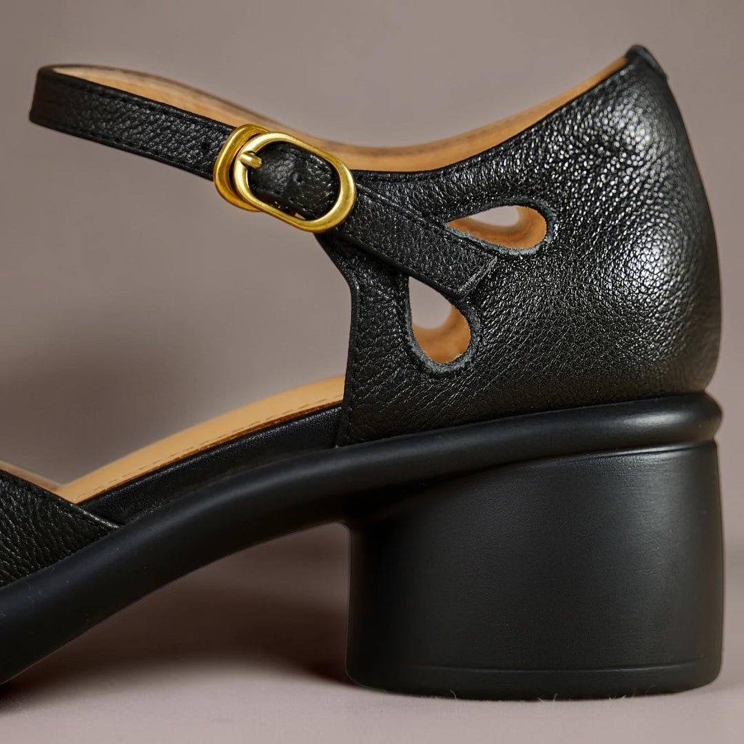 Claire sandals in black, close-up of buckle strap and block heel
