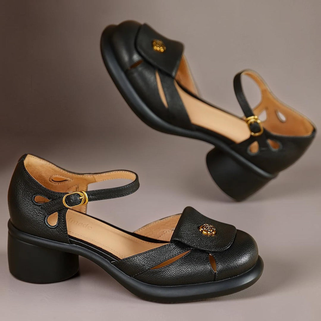 Claire adjustable platform sandals in black, angled pair view