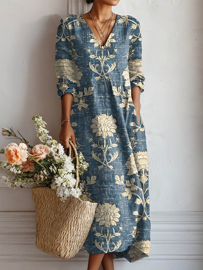 Karin midi dress in blue with cream floral print, full-length front view
