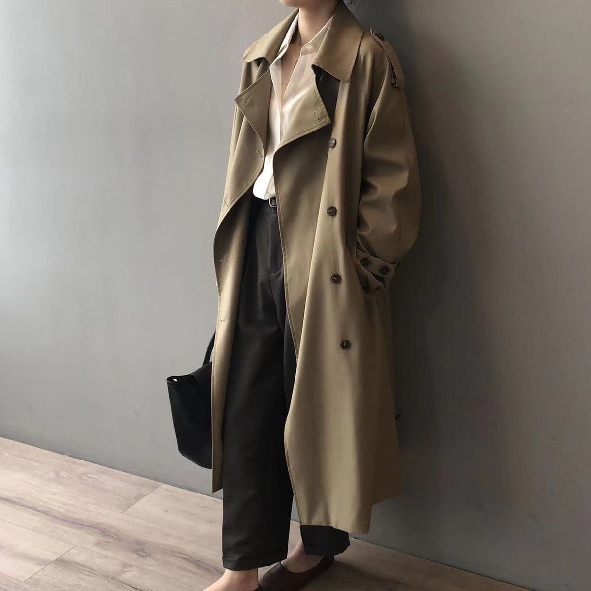 Katherine long double-breasted trench coat in khaki, three-quarter side view