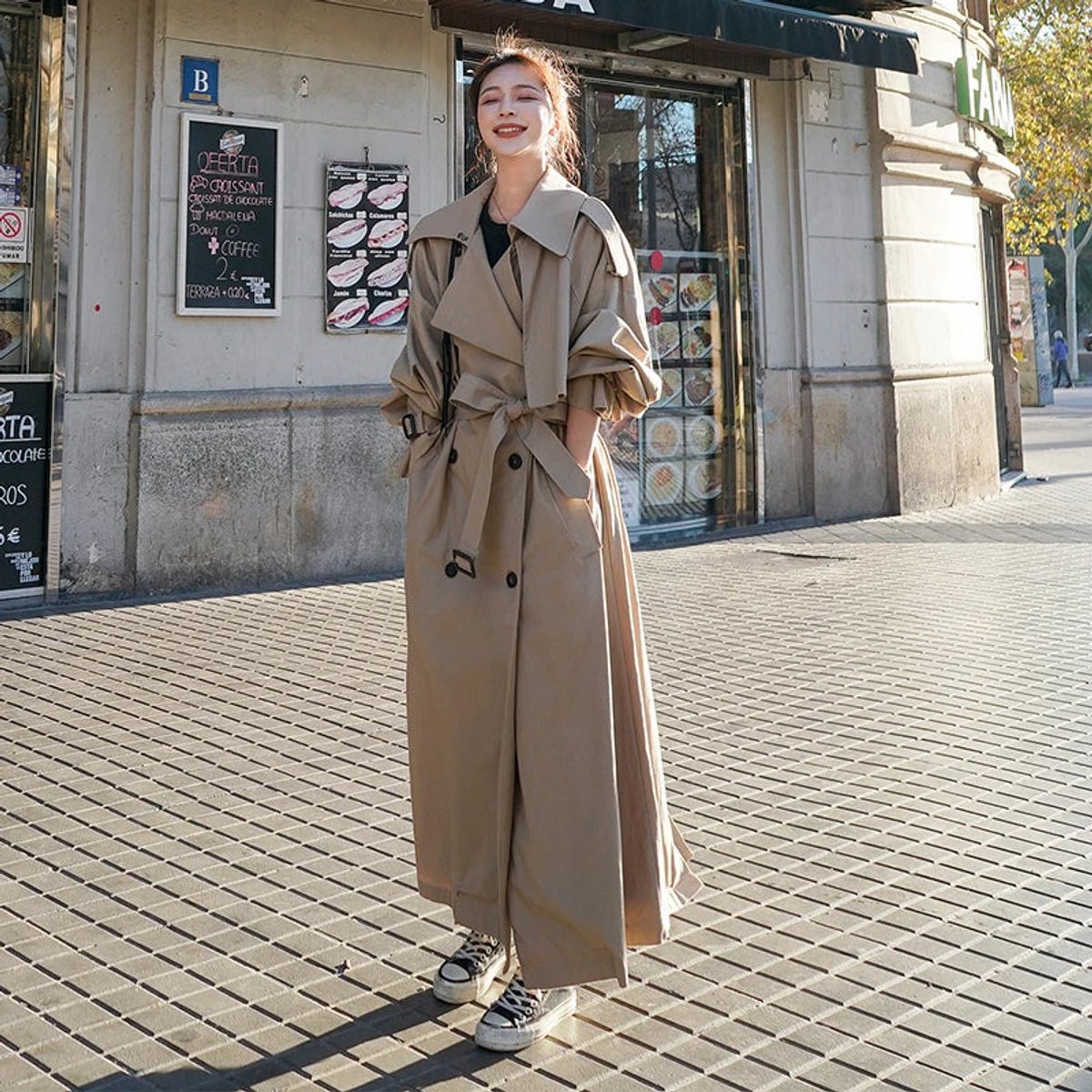 Kay oversized maxi trench coat in khaki, belted, full-length front view on a city street