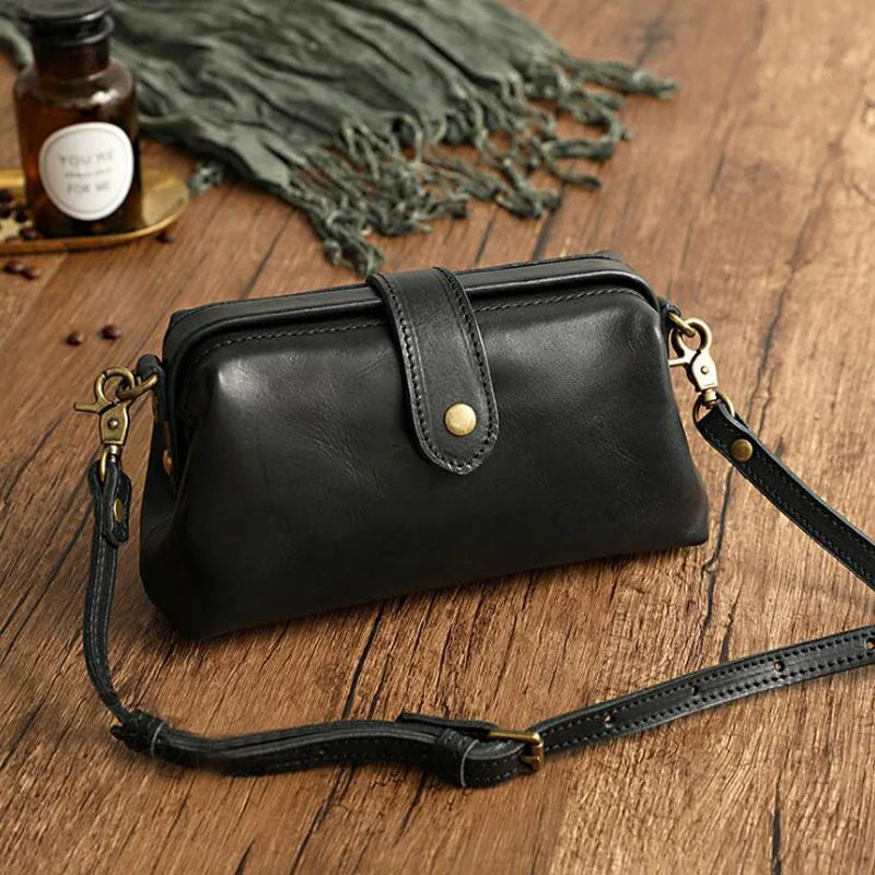 Cressida mini crossbody bag in black, front view