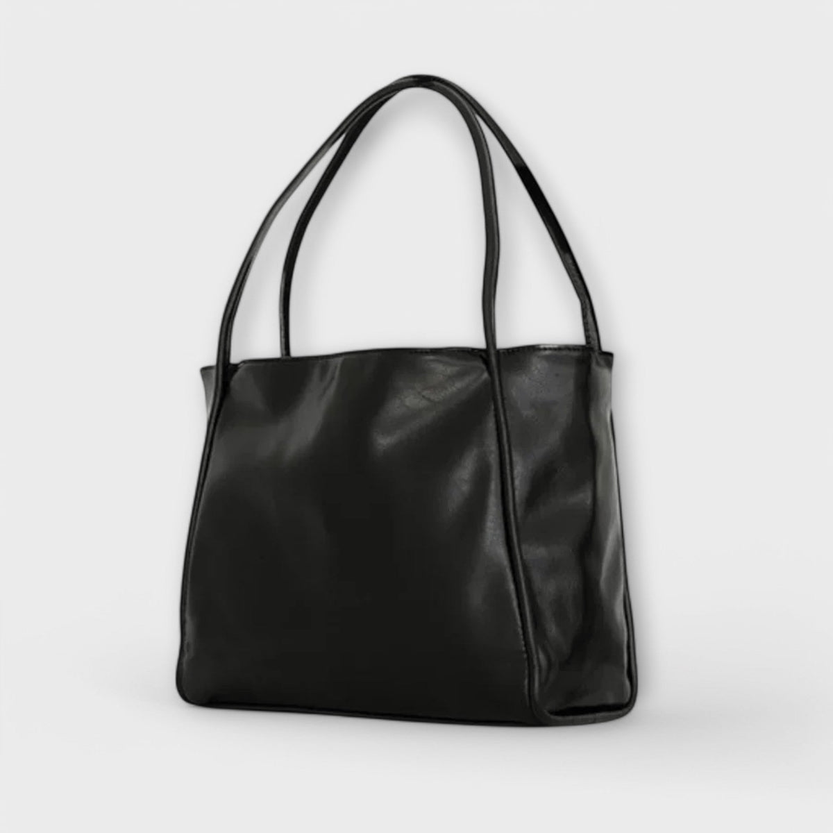 Valerie Blair tote bag in black, three-quarter side view