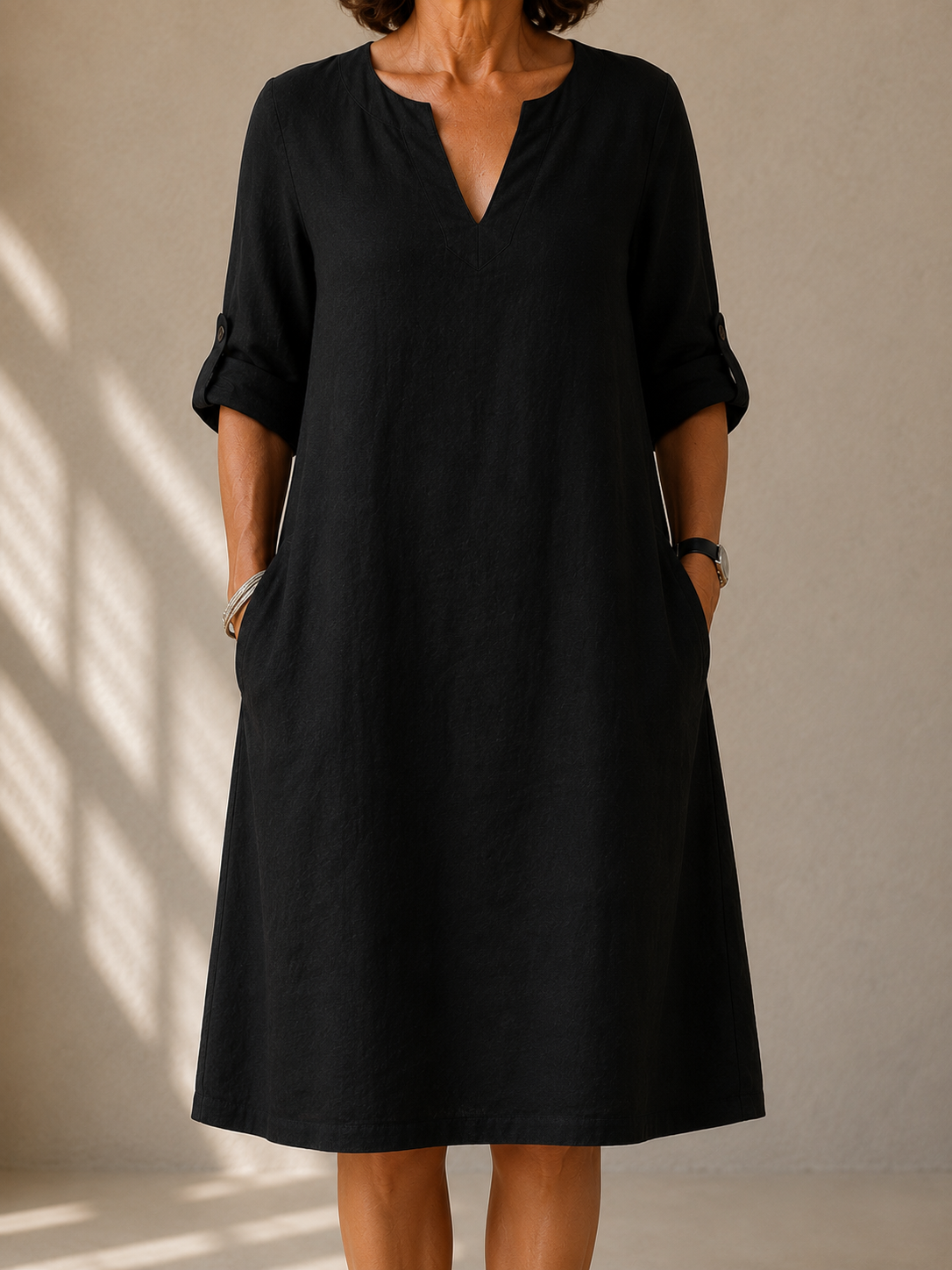 Pauline straight-cut roll-up sleeve dress in black, front view